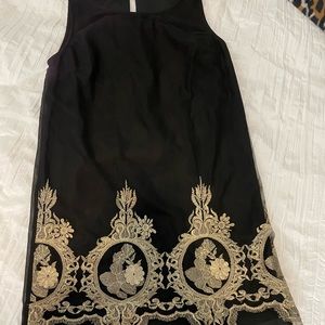Little black dress with gold embroidered details 💫
